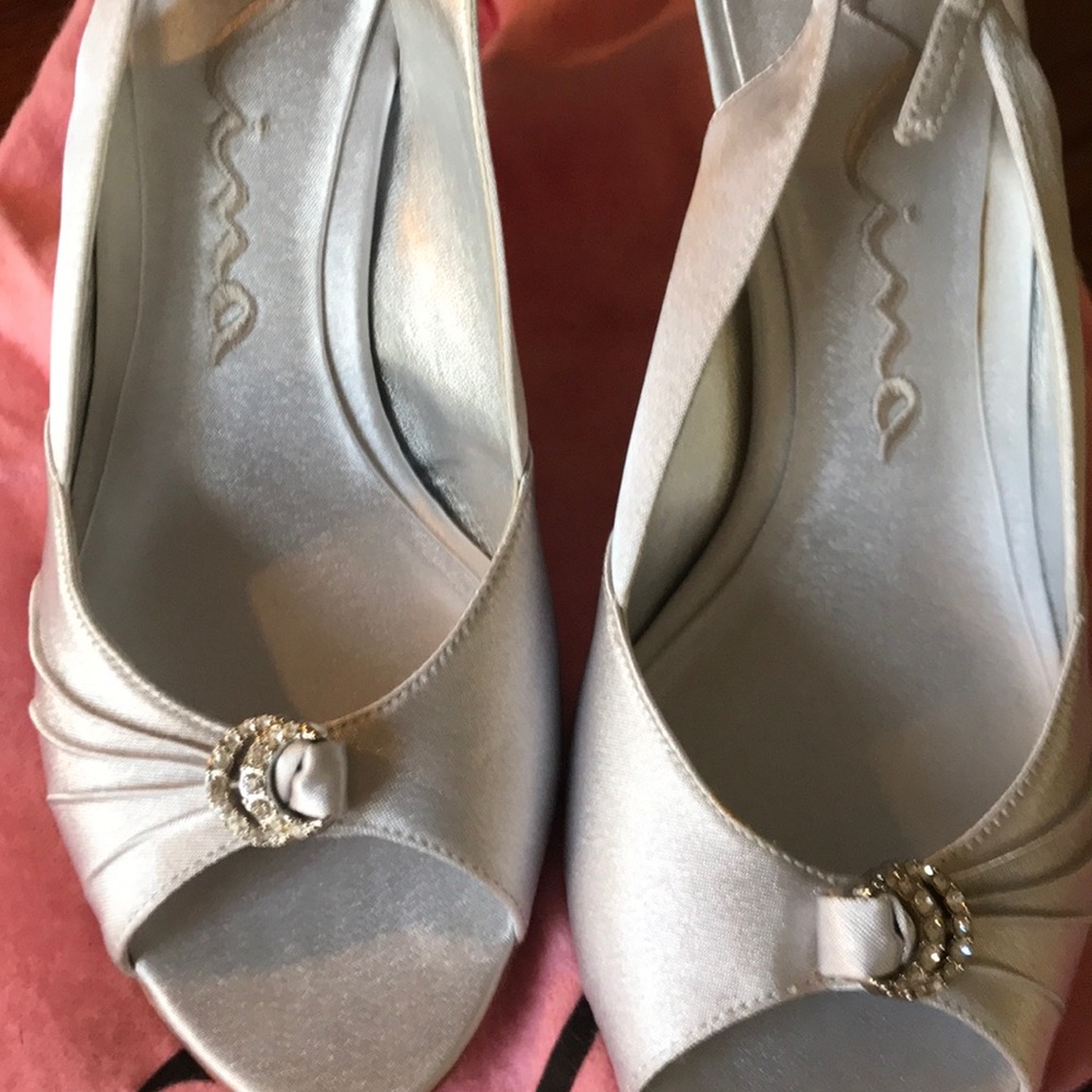 Nina open toe sandal with crystals and strap.